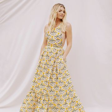 Amanda Kloots amanda kloots in a yellow floral dress