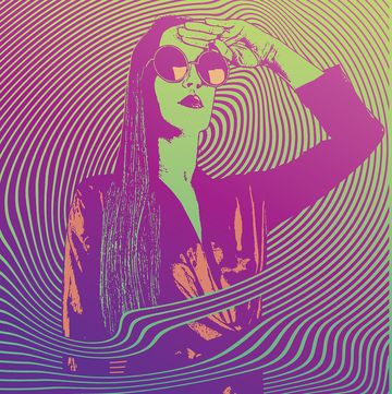 retro styled 1960's psychedelic sensuous woman with half tone pattern