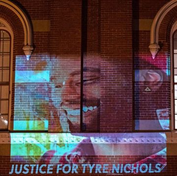 tyre nichols a photo of tyre nichols projected onto a building