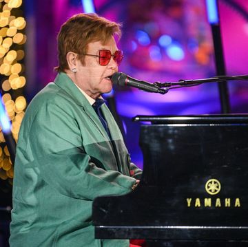 elton john performing at 2022 saks fifth avenue holiday windows